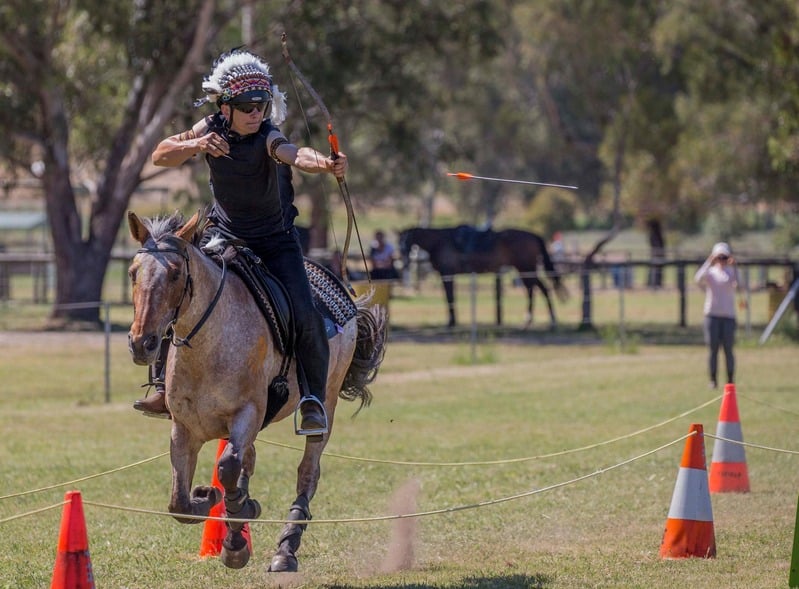 Katrin riding Mary Supersonic in an outdoor arena